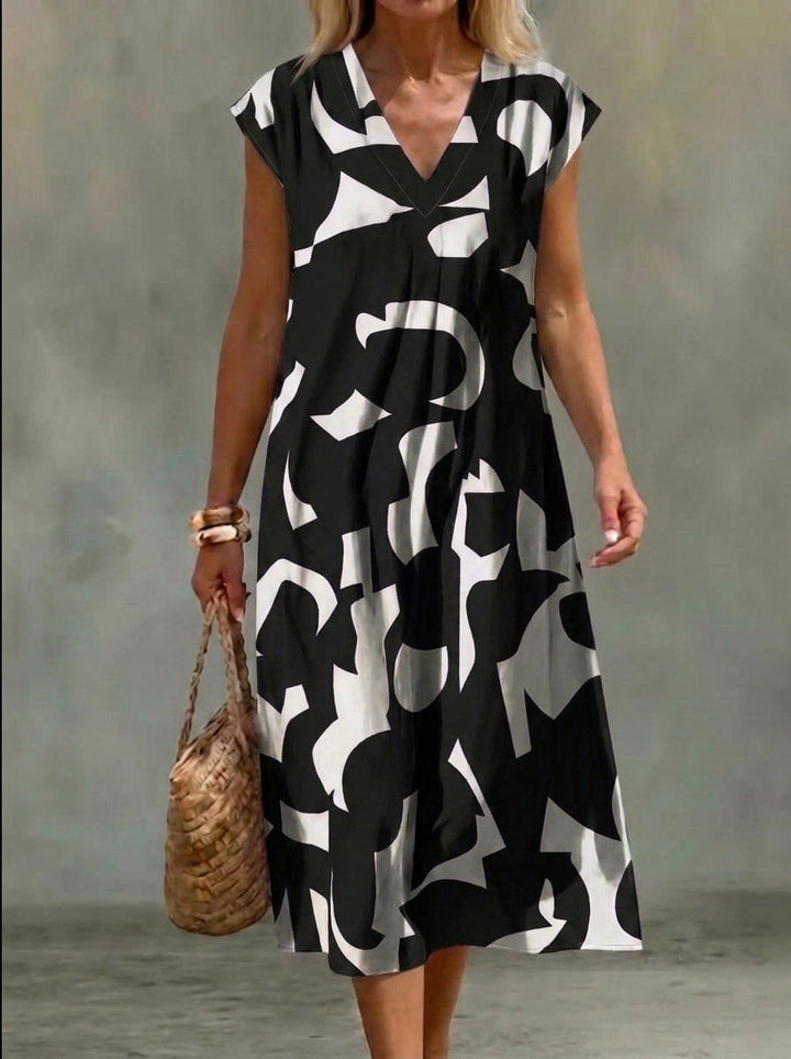 Elena | Vestido Blanco y Negro con Estampado